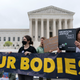 Demonstrators protest outside of the U.S. Supreme Court Tuesday, May 3, 2022 in Washington. A draft opinion suggests the U.S. Supreme Court could be poised to overturn the landmark 1973 Roe v. Wade case that legalized abortion nationwide, according to a Politico report released Monday. Whatever the outcome, the Politico report represents an extremely rare breach of the court’s secretive deliberation process, and on a case of surpassing importance.